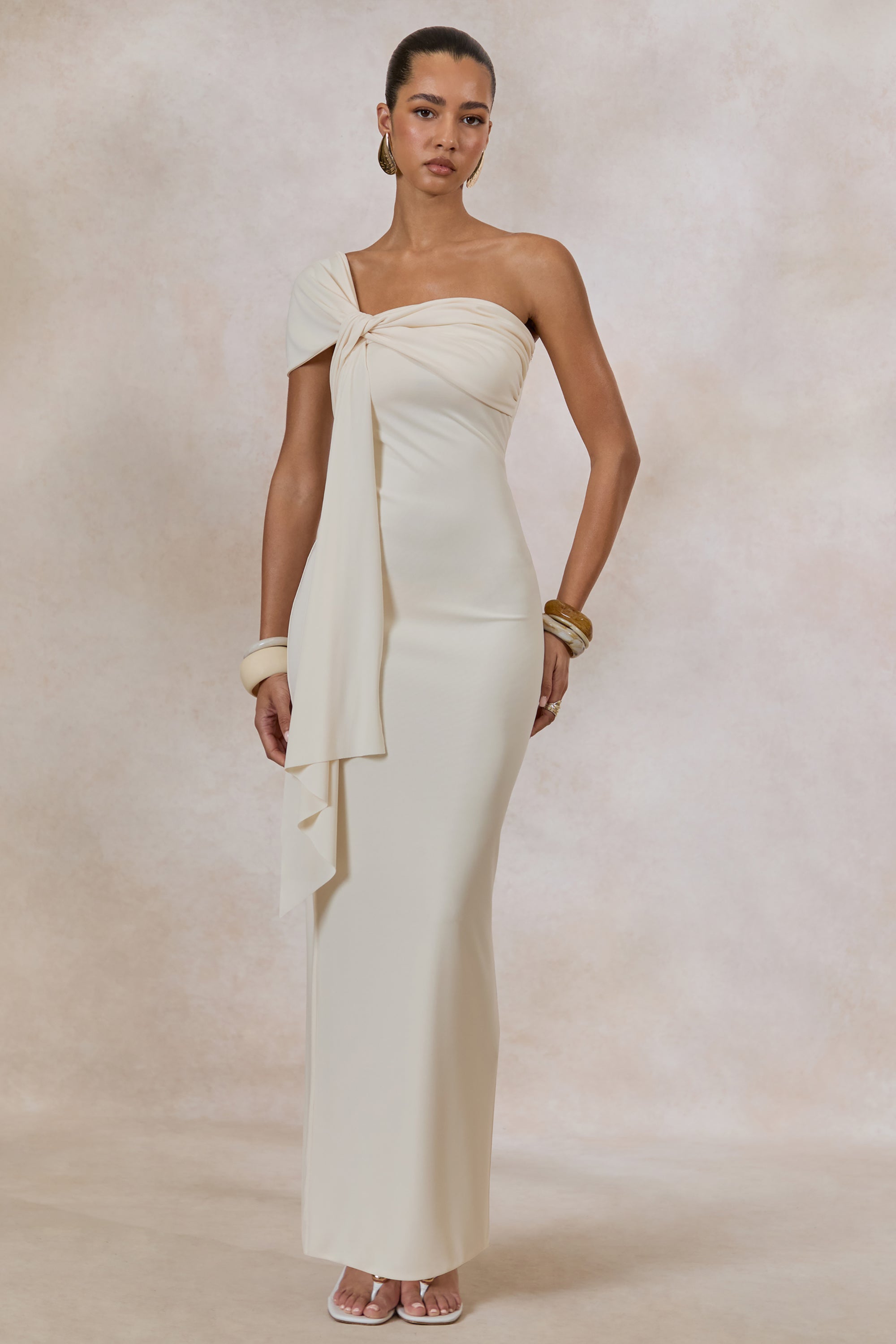 ECM_HR_CL138429111---Airi-_-Cream-Asymmetric-Neck-Maxi-Dress-With-Gathered-Detailing-And-Sash0.jpg