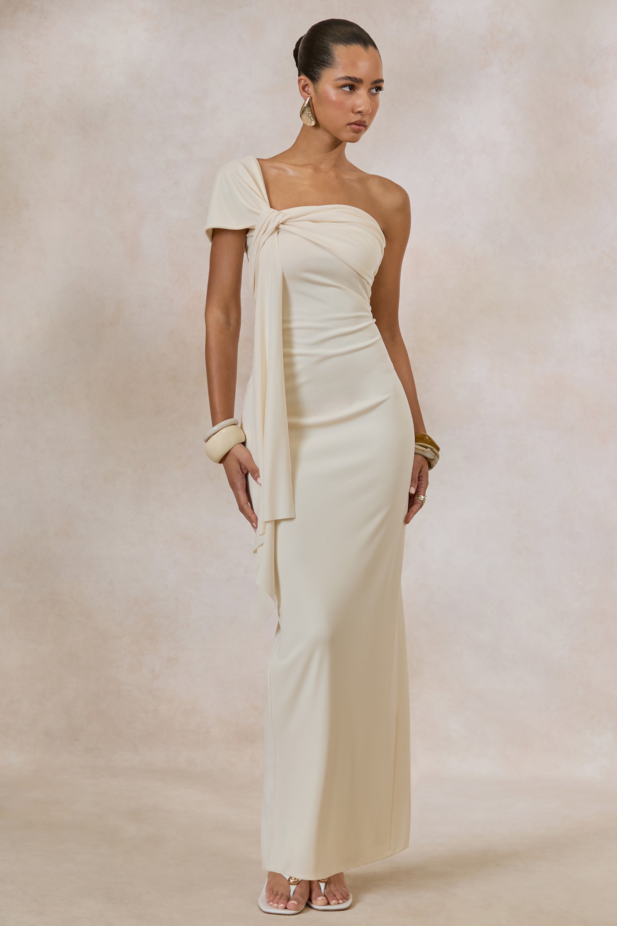 ECM_HR_CL138429111---Airi-_-Cream-Asymmetric-Neck-Maxi-Dress-With-Gathered-Detailing-And-Sash1.jpg