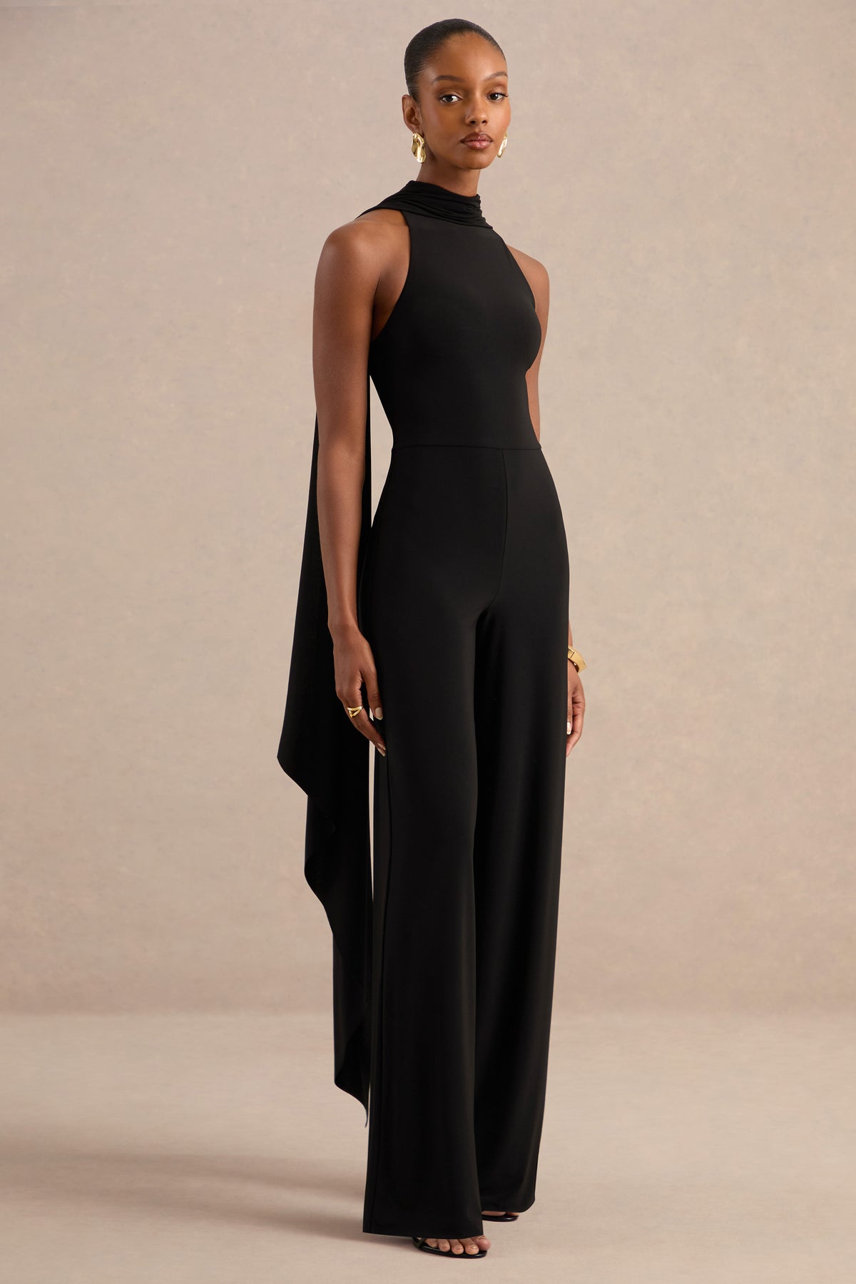 ECM_HR_CL138739001 - Cybelle Black Halter-Neck Jumpsuit With Cape Detail0.jpg